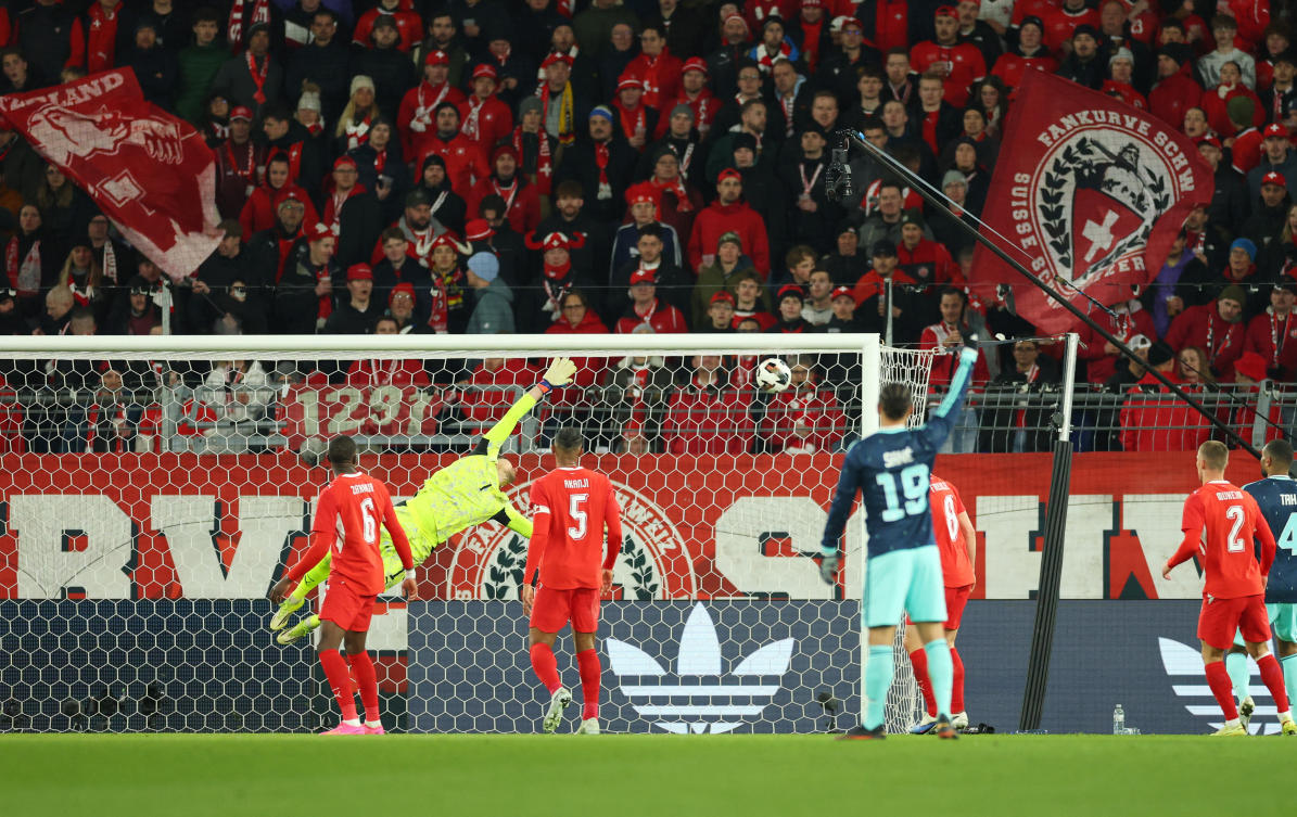 Above, Germany’s Florian Wirtz scores their third goal past Switzerland’s Gregor Kobel. (Reuters)