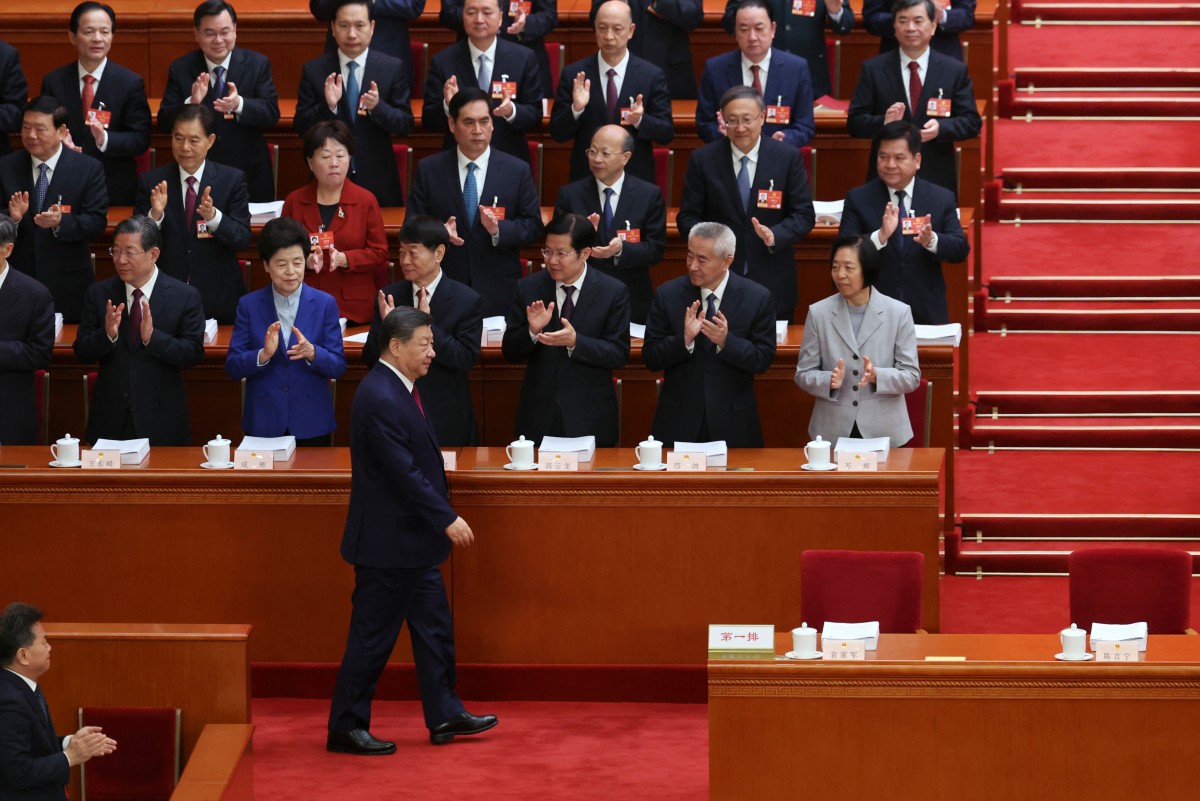 Chinese President Xi Jinping arrives for the opening session of the National People's Congress at the Great Hall of the People in Beijing, China. (AFP)