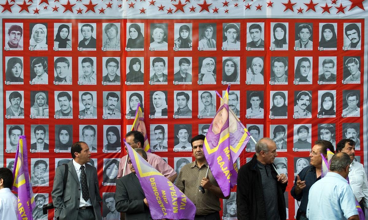 Supporters of the People's Mojahedin Organisation of Iran (PMOI) take part in a demonstration outside of the Iranian embassy in west London on July 31, 2010 to draw attention to human rights abuses including punishments such as stoning and executions. (FILE/AFP)