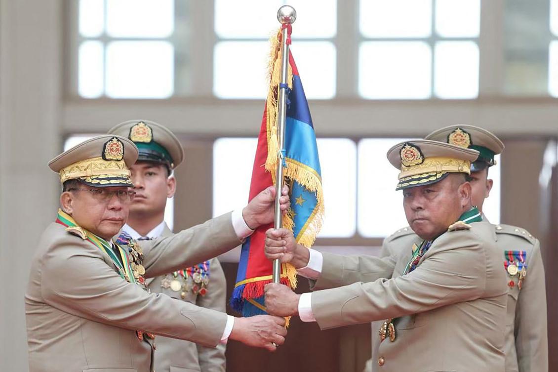 This handout picture taken and released on March 30, 2026 by the Myanmar Military Information Team shows Myanmar's outgoing military chief Min Aung Hlaing (L) and his successor Ye Win Oo (R) during a handover ceremony in Naypyidaw. ( AFP)