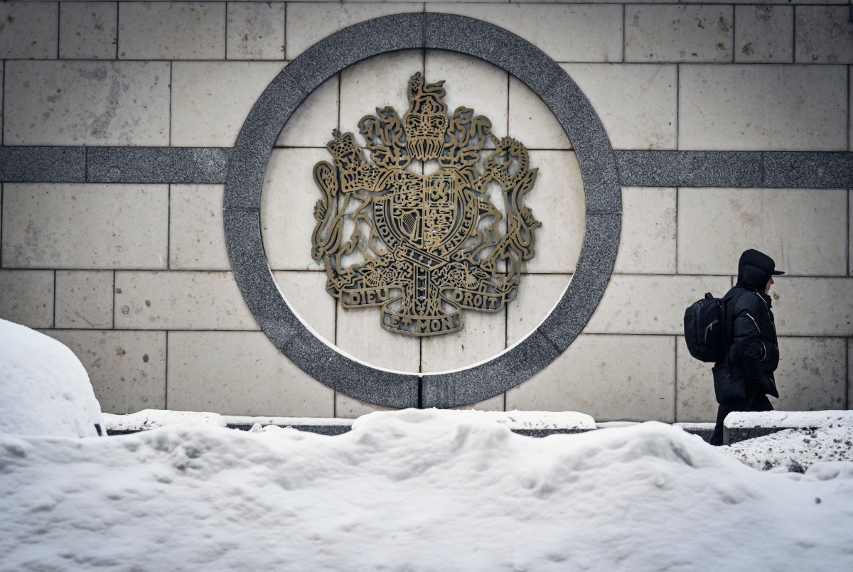 A person walks past the British embassy building in Moscow, Russia. (AFP)