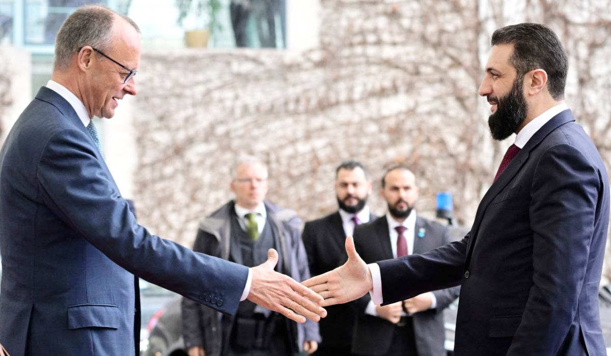German Chancellor Friedrich Merz (L) welcomes Syrian President Ahmed al-Sharaa at the Chancellery in Berlin on March 30, 2026. (AFP)