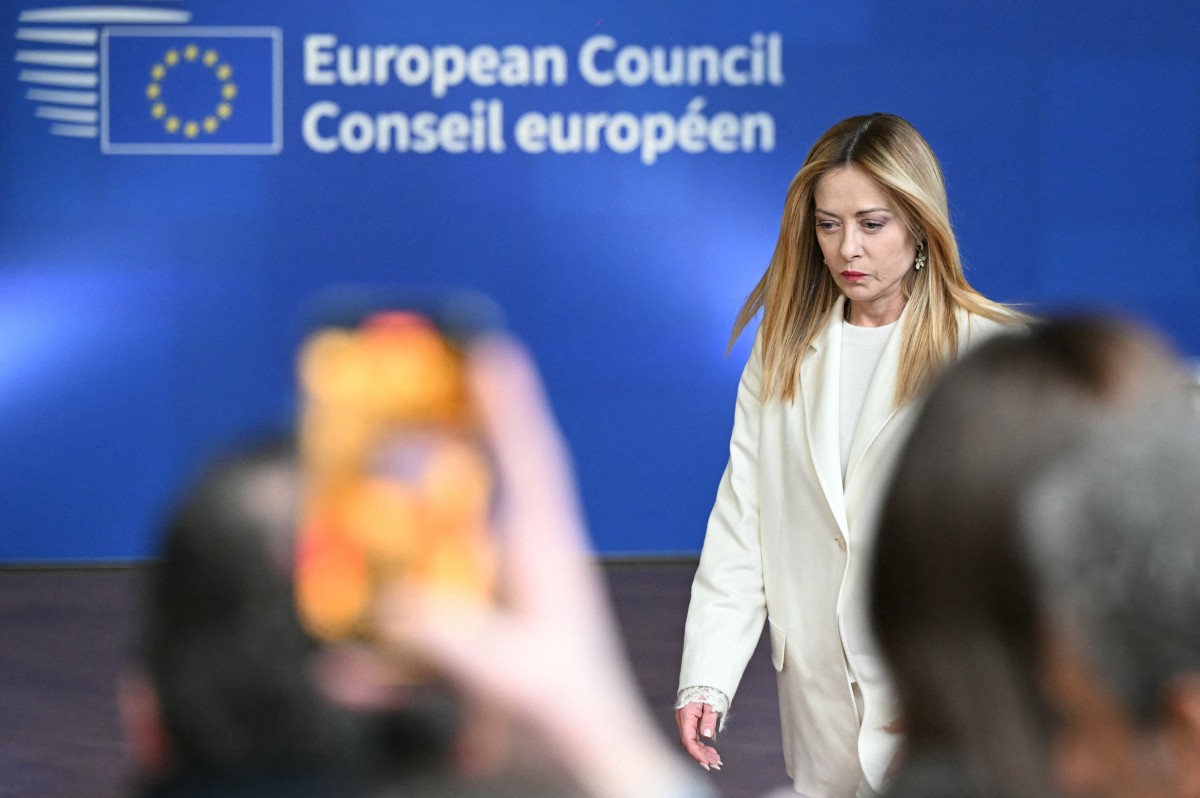 Italy's Prime Minister Giorgia Meloni arrives for a press conference during the EU Summit at the EU headquarters in Brussels, Belgium. (AFP)