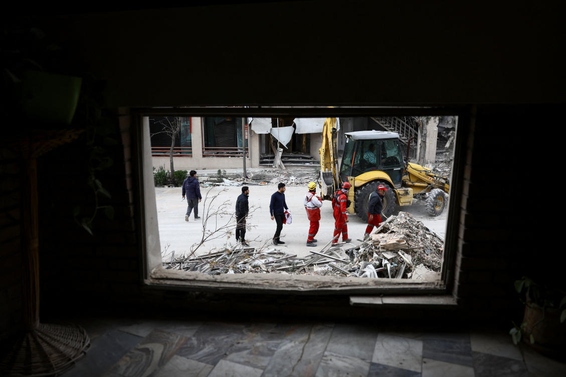 Emergency responders work at a site of the Qatari Al-Araby TV and business building damaged by a strike, as the U.S.-Israeli conflict with Iran continues, in Tehran, Iran, March 29, 2026. Majid Asgaripour/WANA (West Asia News Agency) via REUTERS ATTENTION EDITORS - THIS PICTURE WAS PROVIDED BY A THIRD PARTY