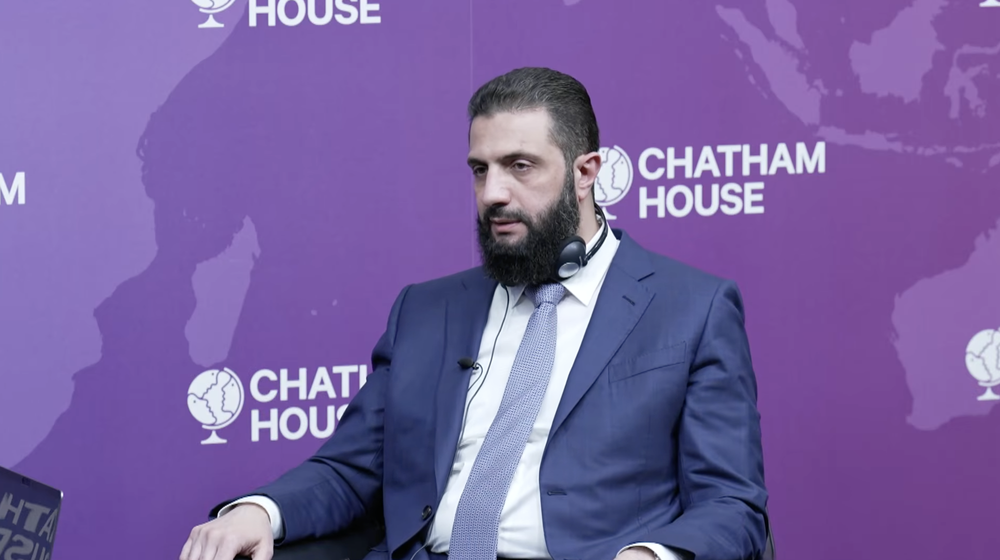 Syrian President Ahmed Al-Sharaa speaks at an event hosted by the Chatham House think tank in London. (Screengrab)