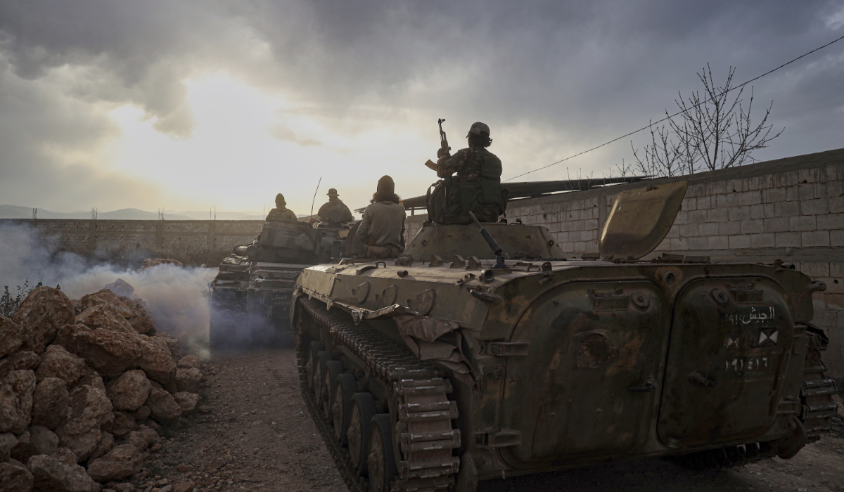 Syrian troops maneuver in the village of Hawsh al-Sayyid Ali, located 2 km (1.24 miles) from the Lebanon border, Syria, Monday, March 17, 2025. (AP)