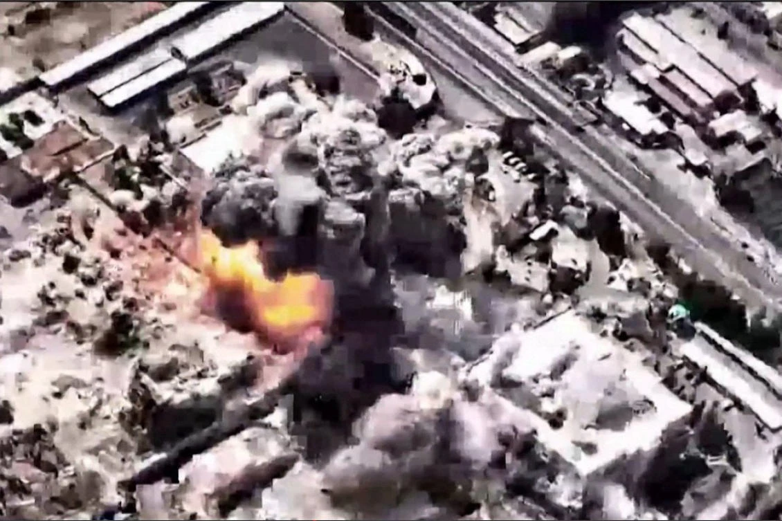 A video grab image taken from footage released by the Israeli military on March 1, 2026, shows what it says are large-scale strikes on "the headquarters of the Iranian terror regime" in Tehran on March 1. (AFP)