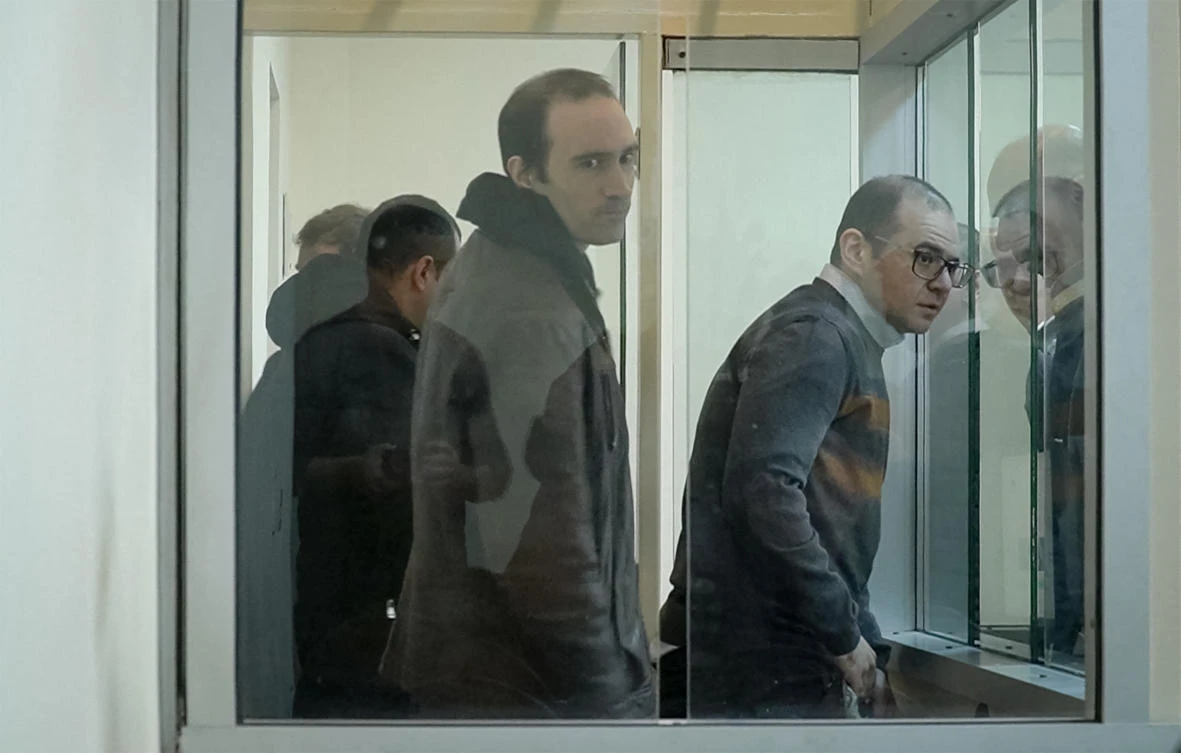 This grab taken from footage released by AFP video shows French national Martin Ryan (C) during a court hearing as part of his trial on spy charges in Baku on January 6, 2025. (AFP)