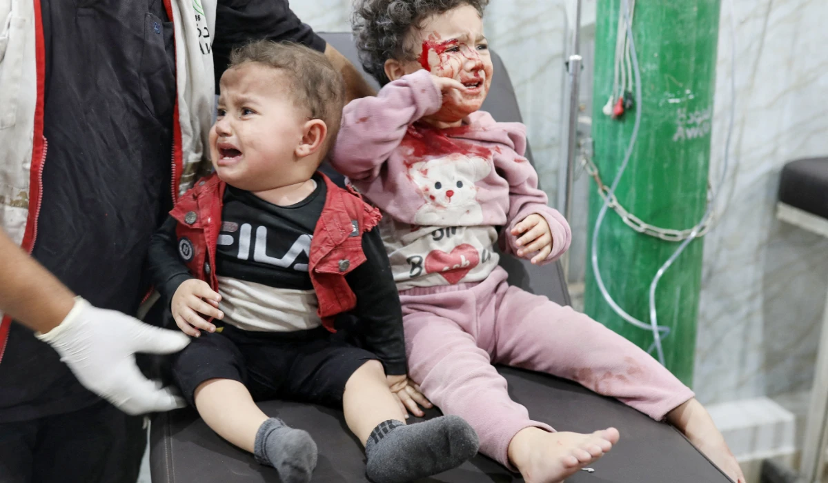 Palestinian children receive medical attention at Al-Awda Hospital, following an Israeli air strike, according to medics, in Gaza City November 22, 2025. (REUTERS)