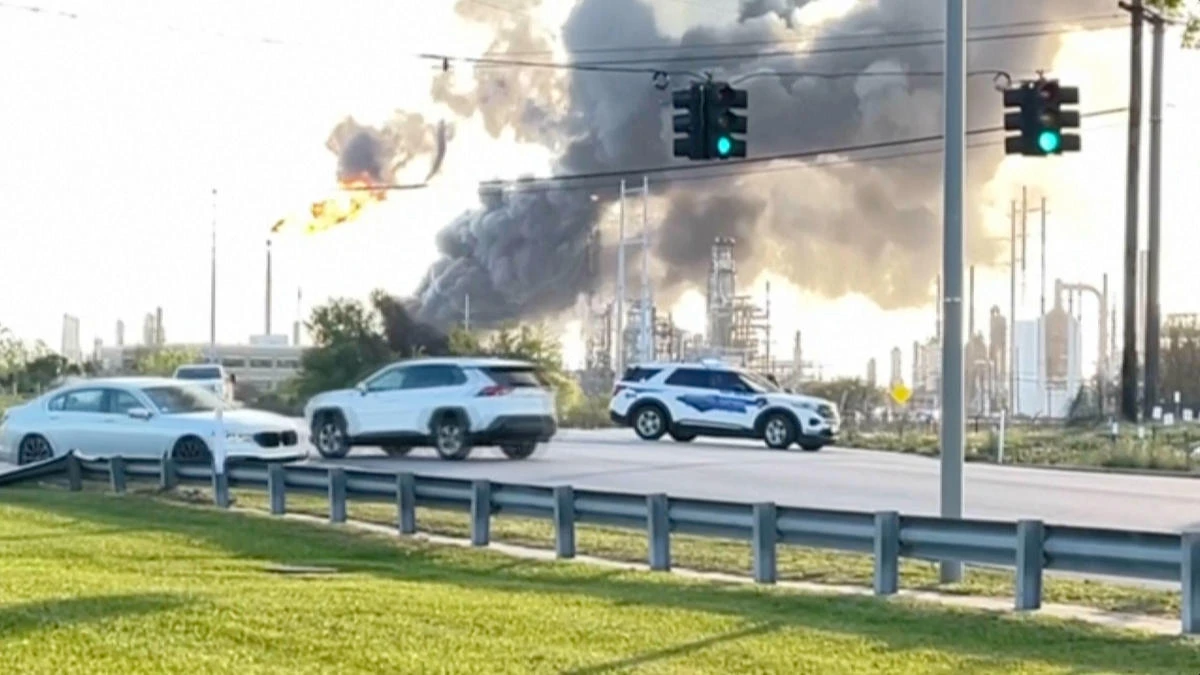 Smoke rises near the Valero Port Arthur Refinery in Port Arthur, Texas Monday, March 23, 2026. (KBMT via AP)