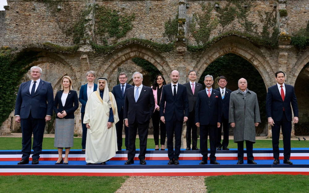 The foreign ministers of G7 and invited nations - including Saudi Arabia's Prince Faisal bin Farhan (third from left) - pose for a family photo on the second day of the G7 Foreign Ministers' Meeting in Vaux-de-Cernay Abbey in Cernay-la-Ville near Paris. (Reuters)