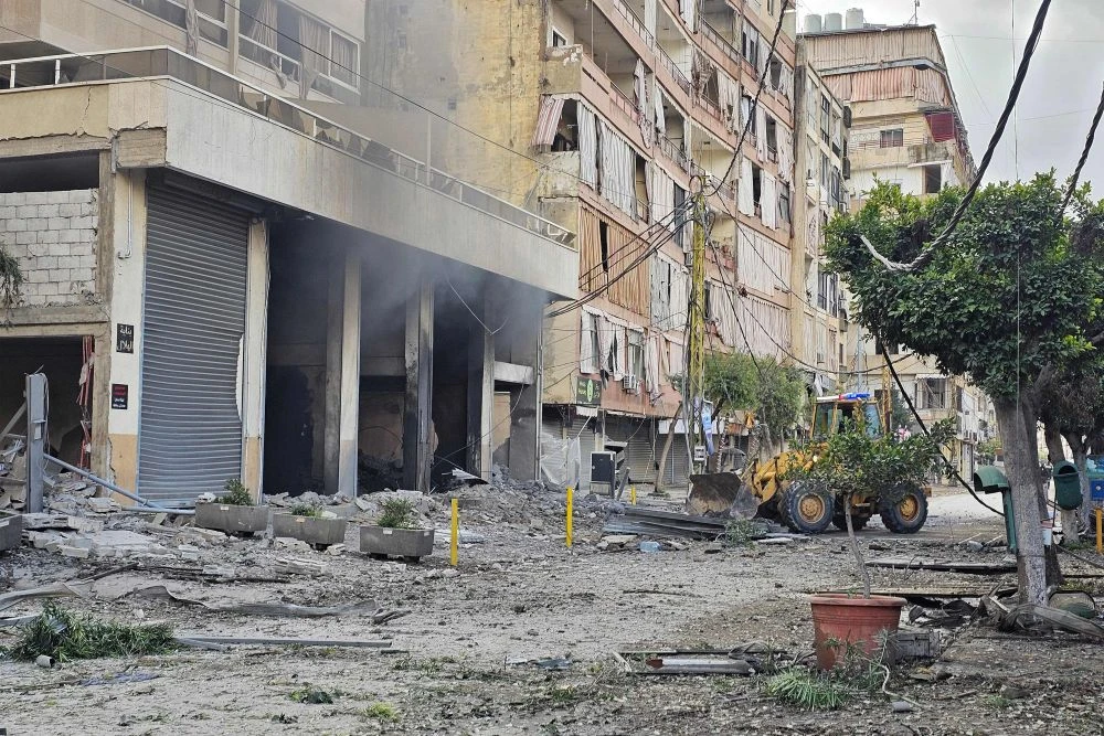 A bulldozer removes rubble from the site of an overnight Israeli airstrike on the Haret Hreik neighborhood in Beirut’s southern suburbs on March 30, 2026. (AFP)