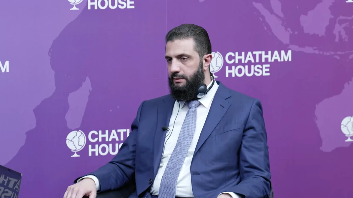 Syrian President Ahmed Al-Sharaa speaks at an event hosted by the Chatham House think tank in London. (Screengrab)