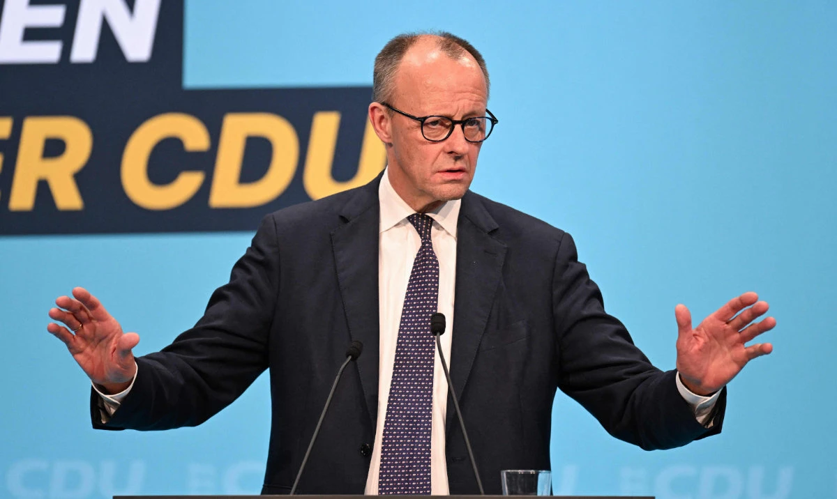 German Chancellor Friedrich Merz addresses the audience during an election campaign event in Stockach, southern Germany. (AFP)