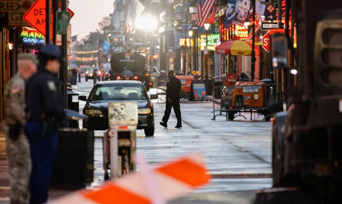 Law enforcement officers work at the site where people were killed by a man driving a truck in an attack, New Orleans. (Reuters)