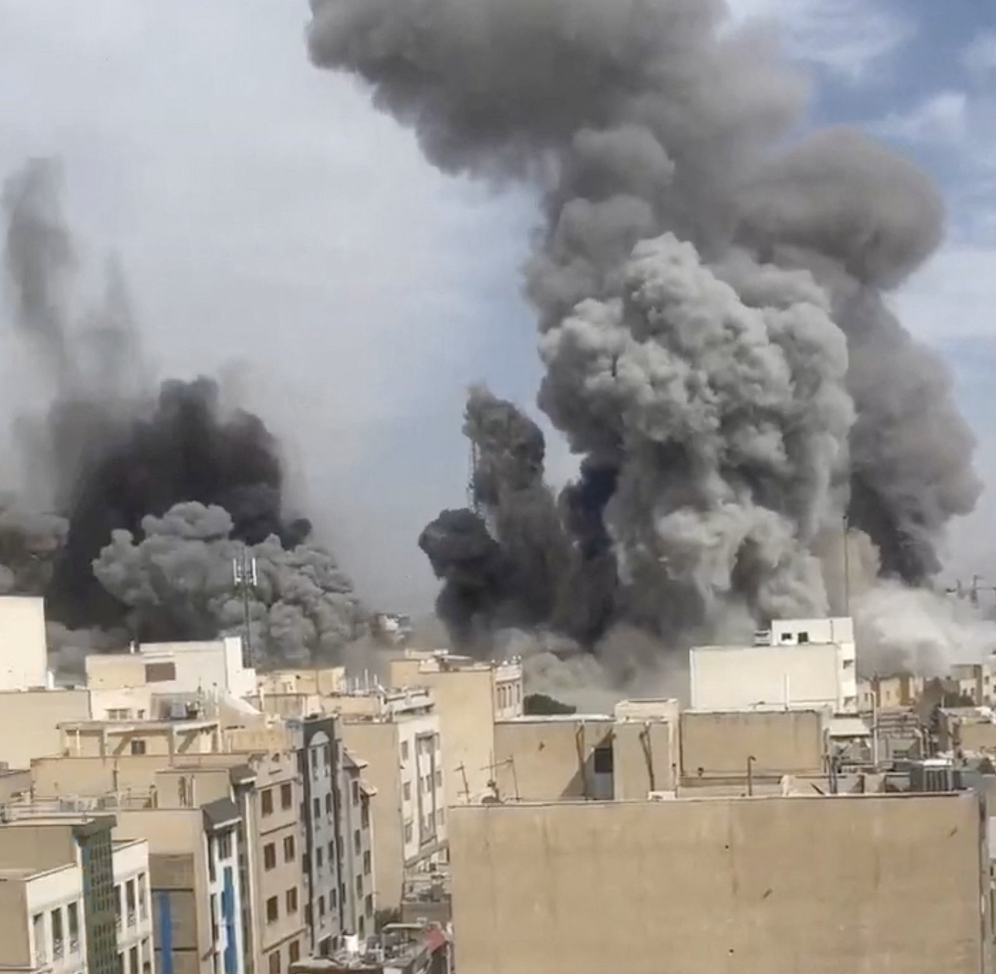 Smoke rises following reported explosions, amid the US-Israeli conflict with Iran, in Tehran. (Reuters)