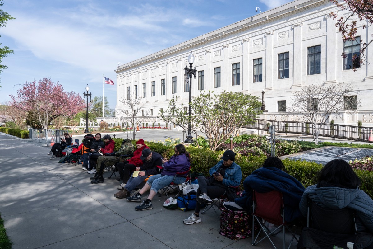 People wait in line outside the Supreme Court Justice building to attend oral arguments on birthright citizenship in Washington DC, US. (AFP)