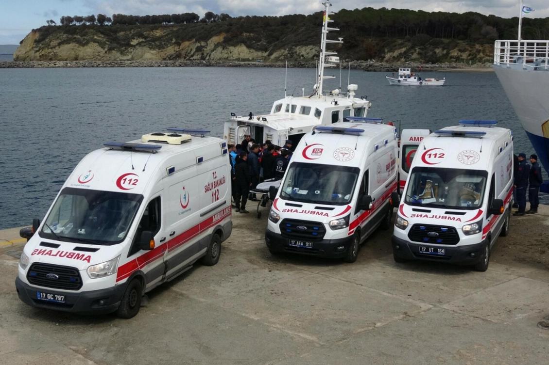 An ambulances parked by a coast guard boat. (File/AFP)