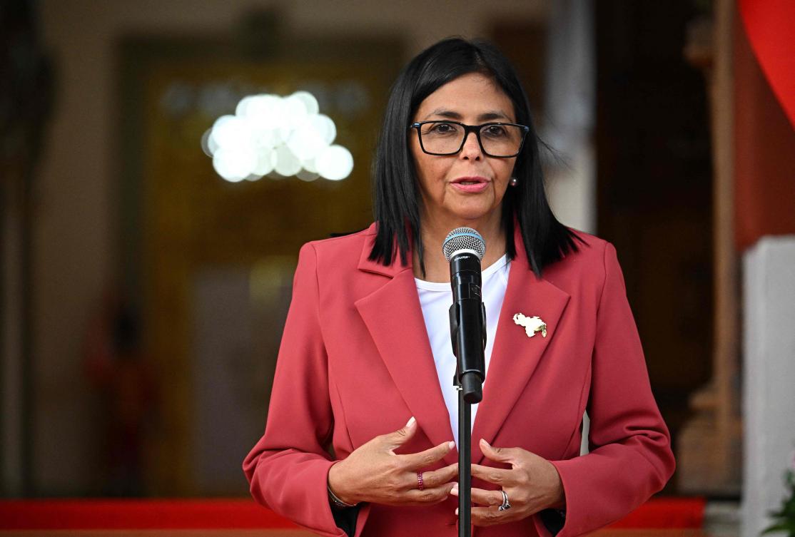 Venezuela’s interim president, Delcy Rodriguez speaks alongside US Interior Secretary Doug Burgum (out of frame), after their meeting at the Miraflores Presidential Palace in Caracas on March 4, 2026. (Photo by Federico PARRA / AFP)