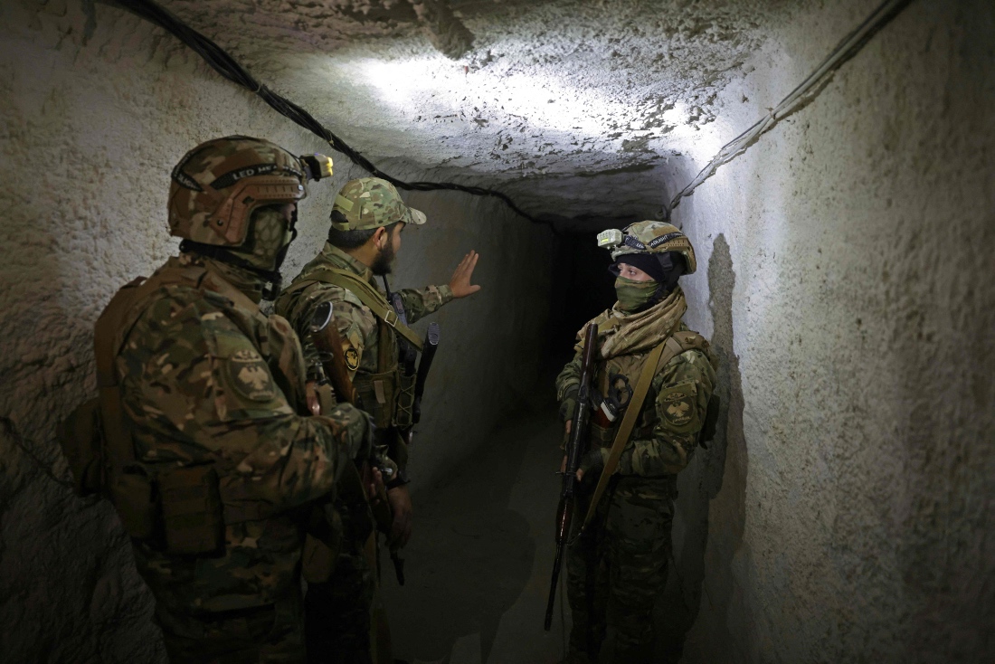 Syrian army soldiers inspect a tunnel on the Syrian–Lebanese border in the rural area of Al Qusayr. (AFP)
