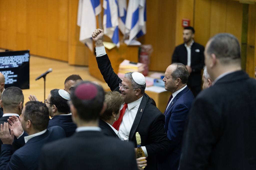 Israel's Minister of National Security, Itamar Ben-Gvir, center, and lawmakers celebrate after Israel's parliament passed a law approving the death penalty for Palestinians convicted of murdering Israelis, at the Knesset in Jerusalem Monday, March 30, 2026. (AP)