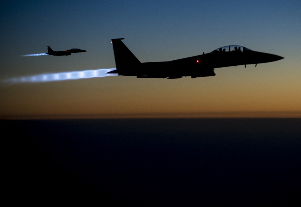 Above, a pair of US Air Force F-15E Strike Eagles flying over northern Iraq on Sept. 23, 2014. A similar warplane was shot down over Iran. (US Air Forces Central Command via DVIDS/AFP file photo)