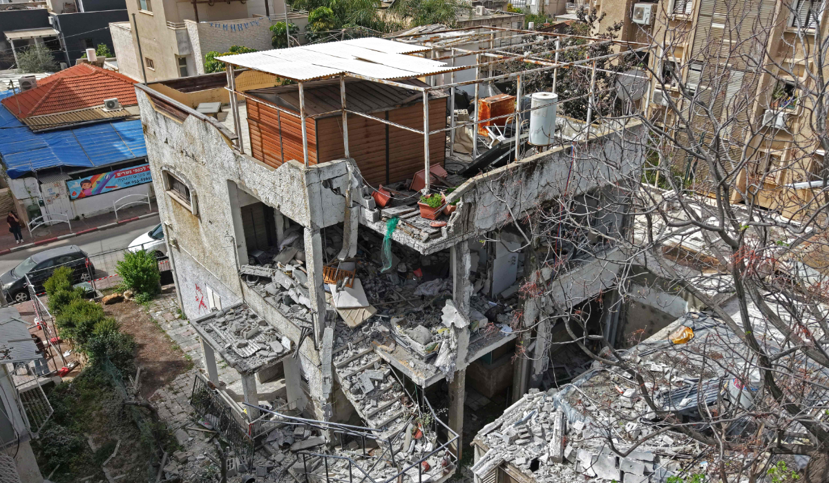 This aerial photograph shows the damaged building that was hit by an Iranian strike in a residential neighbourhood in Ramat Gan on April 4, 2026. (AFP)