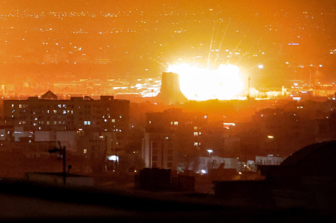 An explosion erupts following strikes near Azadi Tower close to Mehrabad International Airport in Tehran on March 7, 2026. (AFP/File photo)