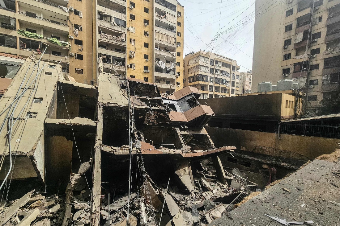 A photograph shows a collapsed building at the site of an overnight Israeli airstrike in the Haret Hreik neighbourhood of Beirut’s southern suburbs, Lebanon. (AFP)