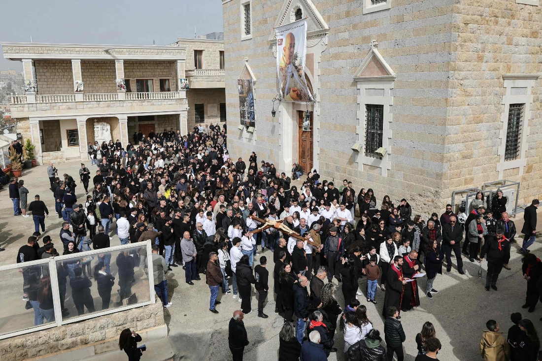 Lebanese Maronite Christians celebrate Good Friday in the southern border village of Qlayaa, Lebanon. (AFP)
