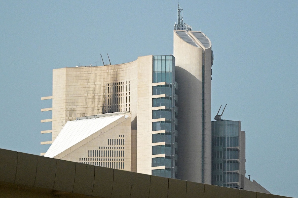 This photograph shows the impact of a fire caused by a drone attack on a building of the Kuwait Petroleum Corporation (KPC), in Kuwait City on April 5, 2026. (AFP)