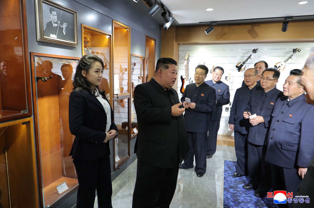 North Korean leader Kim Jong Un and his daughter Kim Ju Ae inspecting a musical instrument store awaiting the opening of the fourth-stage district of the Hwasong Area in Pyongyang. (AFP)