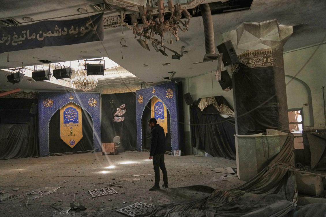 A student inspects damage at a mosque at Tehran’s Sharif University of Technology complex that Iranian authorities say was hit early morning by a US-Israeli strike on April 6, 2026. (AP)