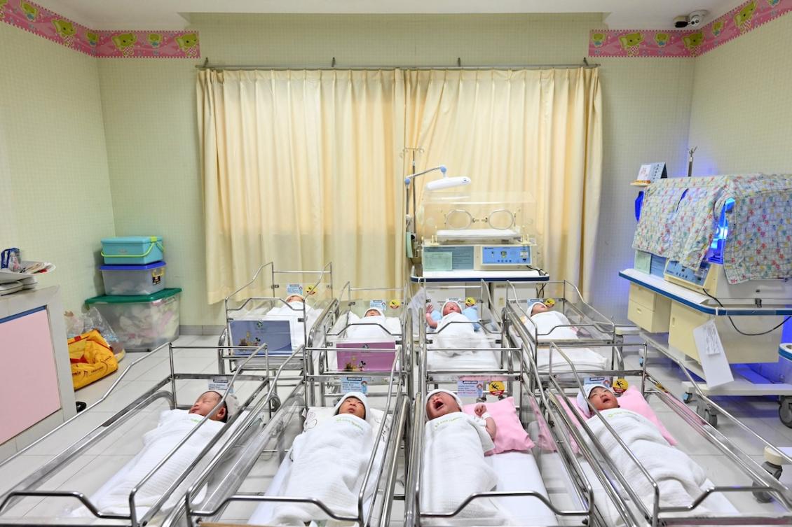 Indonesian prosecutors charged 19 people with human trafficking for their alleged roles in buying babies from new parents and selling them at a profit to clients at home and abroad. Above, newborn babies inside a ward at the Tambak Maternity hospital in Jakarta. (AFP file photo)