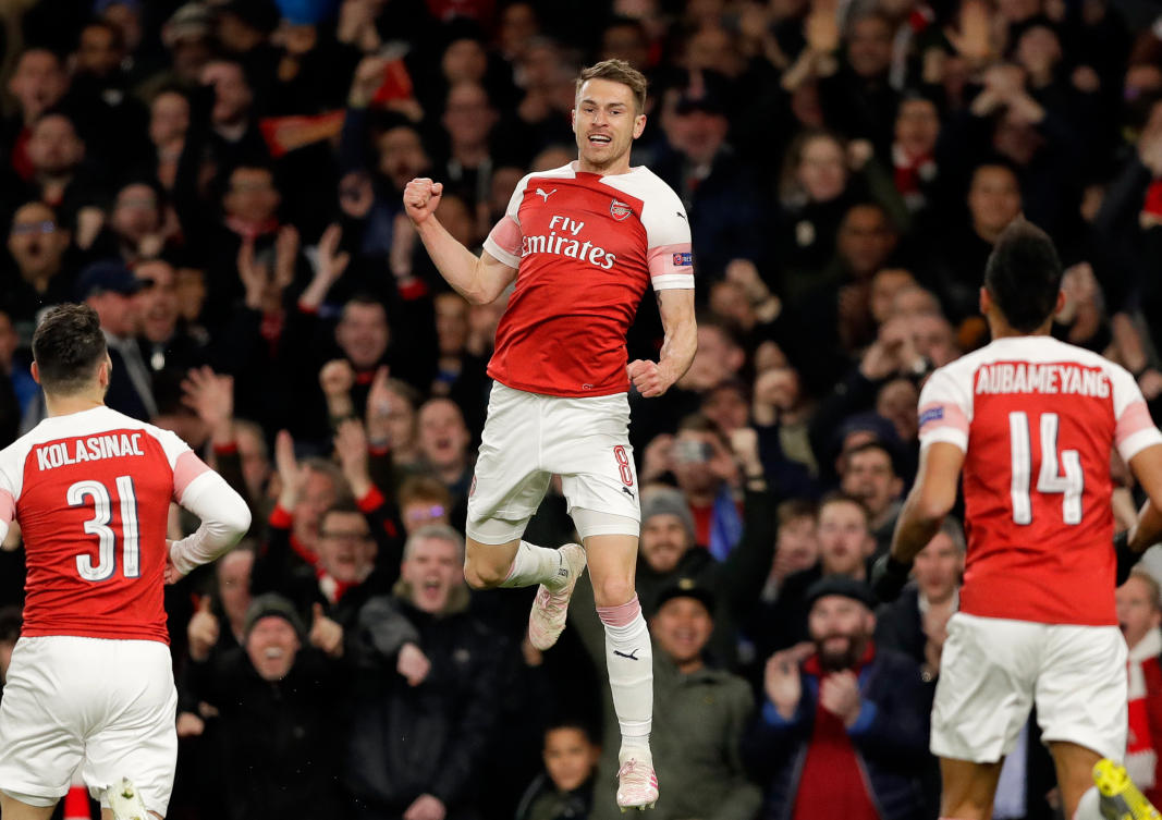 Arsenal’s Aaron Ramsey, center, celebrates after scoring his side’s first goal during the Europa League first leg quarterfinal soccer match between Arsenal and Napoli in London, in 2019. (AP/File)