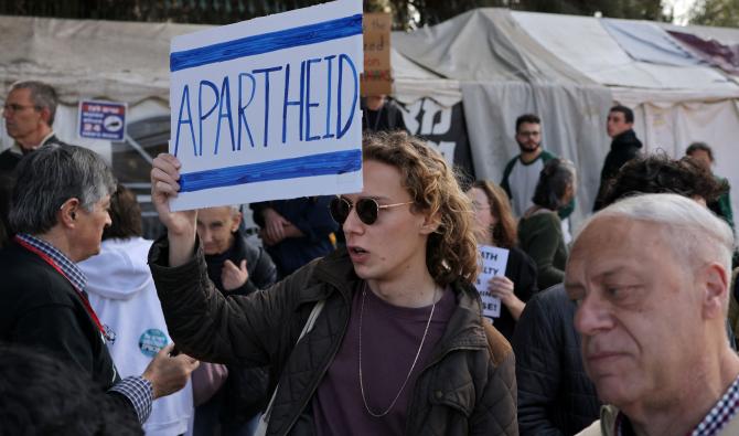 Protesters gather outside the Knesset, Israel’s parliament, in Jerusalem on March 31, 2026, during a demonstration against the adoption of a law authorizing the death penalty for Palestinians. (AFP)