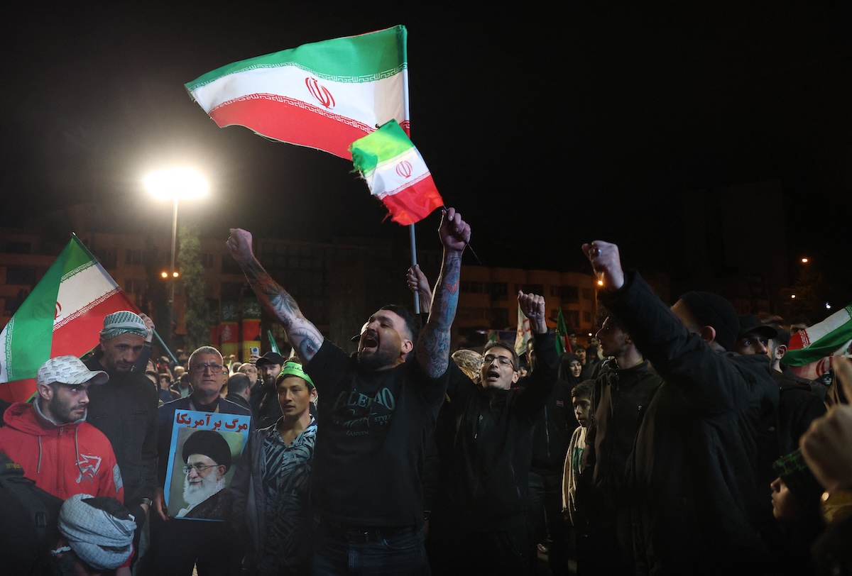 Iranians react after a ceasefire announcement at the Enqelab square, in Tehran, on April 8 2026. (FILE/AFP)
