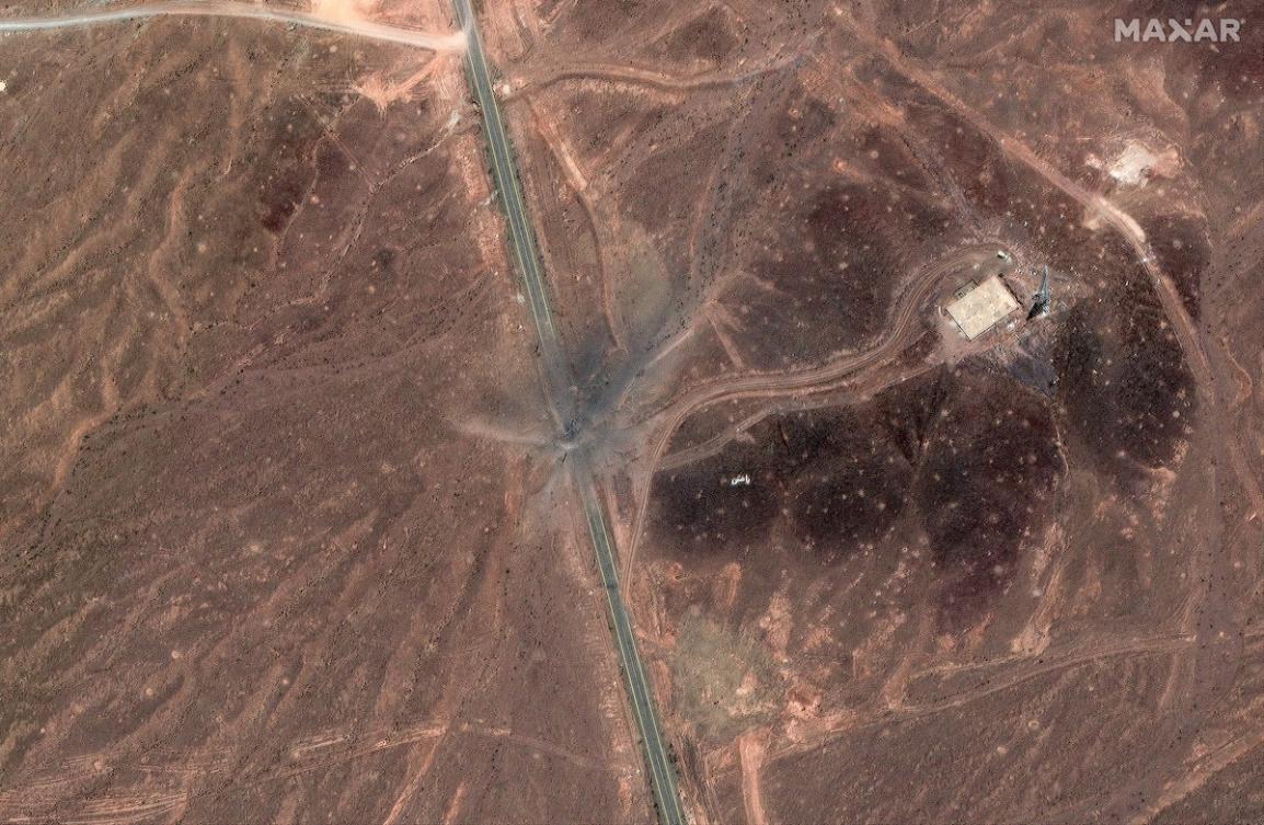 Picture provided by Maxar Technologies and taken on June 24, 2025, shows new airstrike craters on access road to entrance of Iran's Fordow Fuel Enrichment Plant (FFEP), northeast of the city of Qom. (FILE/AFP)