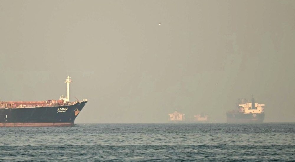 Cargo ships and tankers are seen off the Emirati port of Fujairah, near the Strait of Hormuz, Feb. 25, 2026. (AFP)