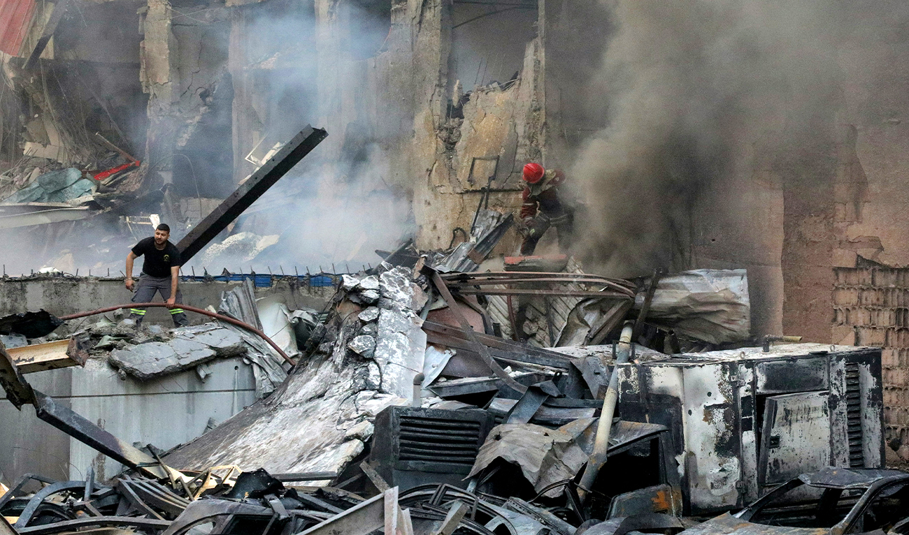 Firefighters attempt to extinguish a fire following an Israeli strike at the Corniche Al-Mazraa neighborhood of Beirut, Lebanon, on April 8, 2026. (AFP)