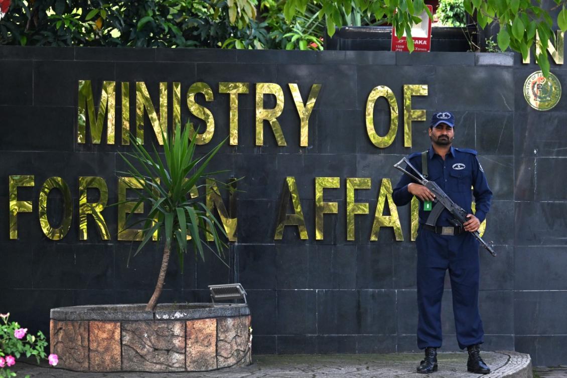 A security personnel stands guard outside the Foreign Ministry office in Islamabad on April 9, 2026. (AFP)