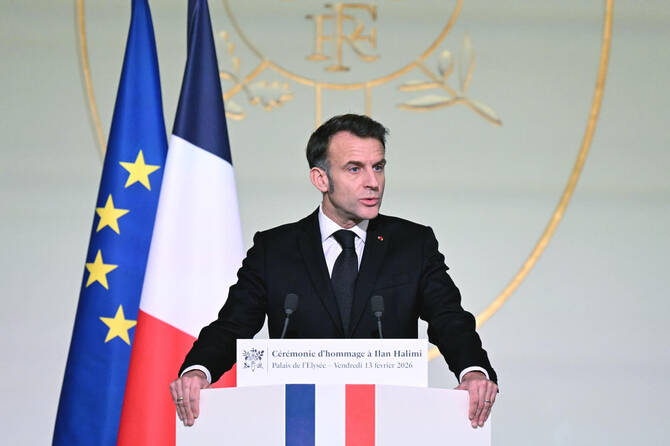 French President Emmanuel Macron will meet Pope Leo XIV for the first time Friday during a visit to the Vatican, against a background of the Iran war that both have condemned. (AFP/File)