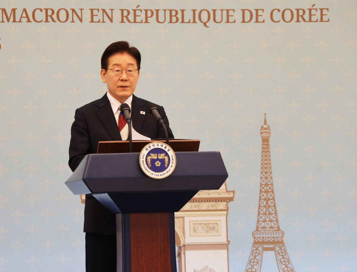 South Korean President Lee Jae-myung speaks during a joint press conference. (AFP)