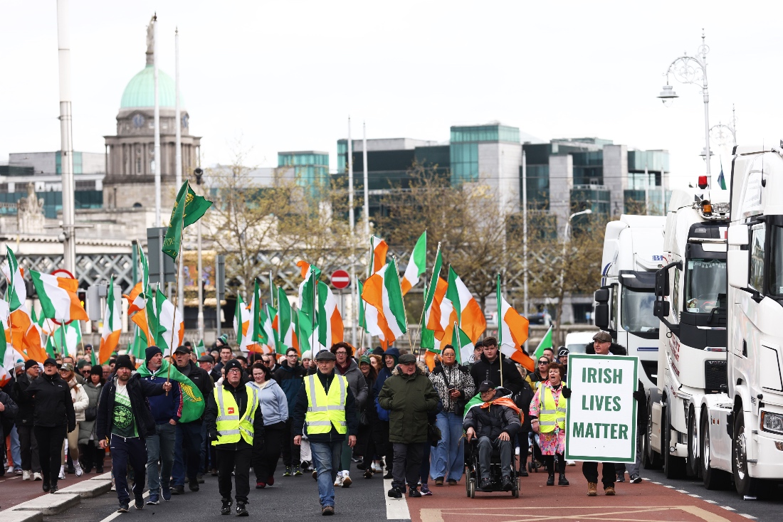 Protesters make their way to O'Connell Street during the fifth day of a National Fuel Protest, in Dublin, Ireland. (AP)