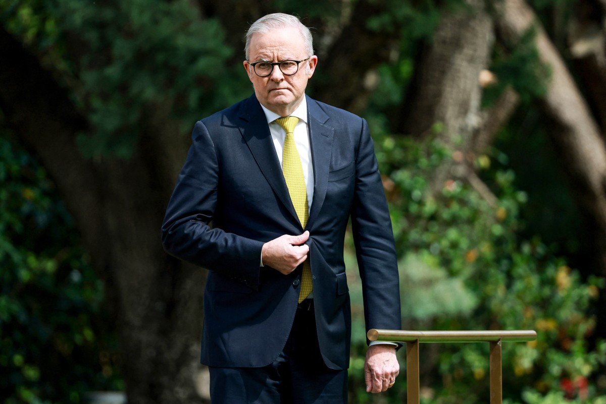 Australia's Prime Minister Anthony Albanese arrives at a welcome ceremony for Israel's President Isaac Herzog at Government House in Canberra, Australia. (AFP)