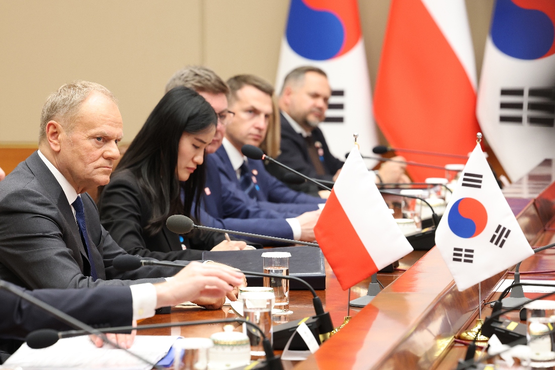 Polish Prime Minister Donald Tusk, left, talks with South Korean President Lee Jae Myung, unseen, at the Blue House in Seoul, South Korea. (AP)