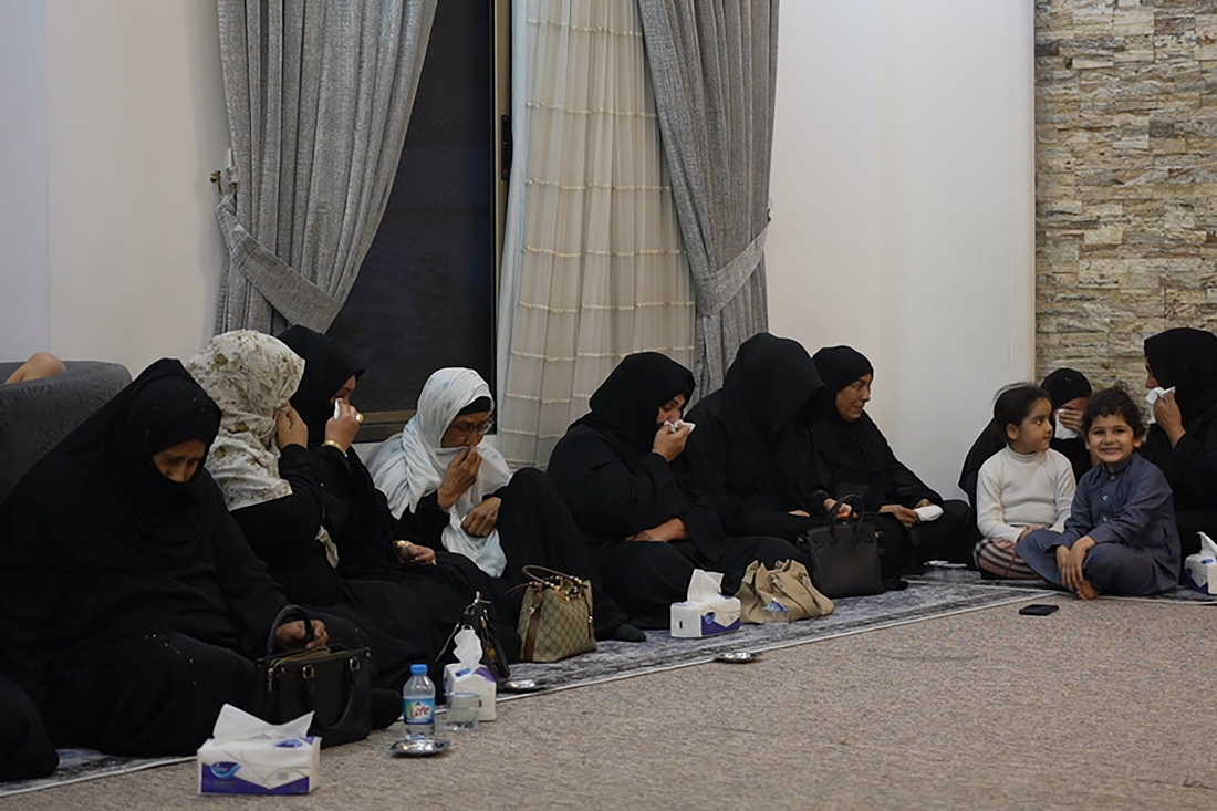 Women sit in quiet grief at the family home of Iraqi singer Sajida Obaid during the seventh-day mourning gathering in Irbil, Iraq. (AP)