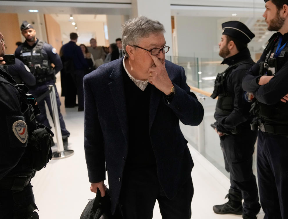 Bruno Pescheux, former director of the Lafarge plant in Syria, arrives at court in Paris on Monday, April 13, 2026, for the verdict in a case involving payments of millions to terrorist groups a decade ago to keep the factory open. (AP Photo/Michel Euler)