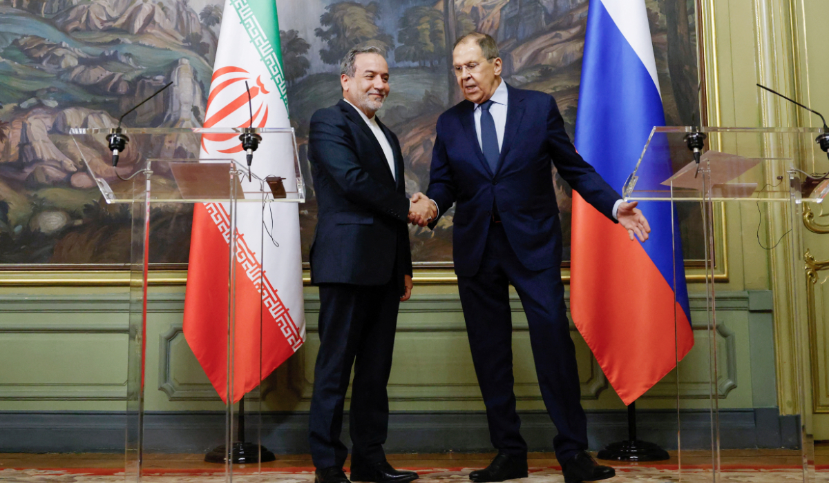 Russia's Foreign Minister Sergei Lavrov and Iran's Foreign Minister Abbas Araqchi shake hands during a press conference following their talks in Moscow, Russia, April 18, 2025. (REUTERS)