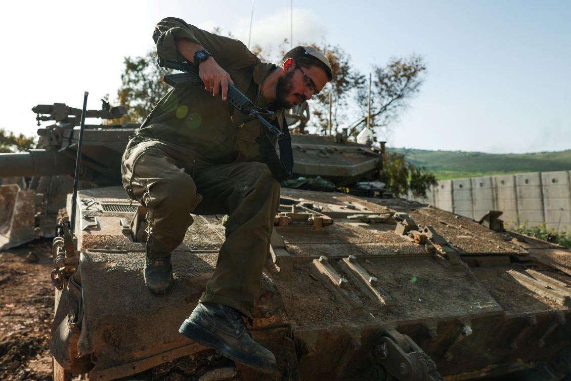 Above, an Israeli soldier gets off a military vehicle near the Israel-Lebanon border, in northern Israel on April 13, 2026. (Reuters)